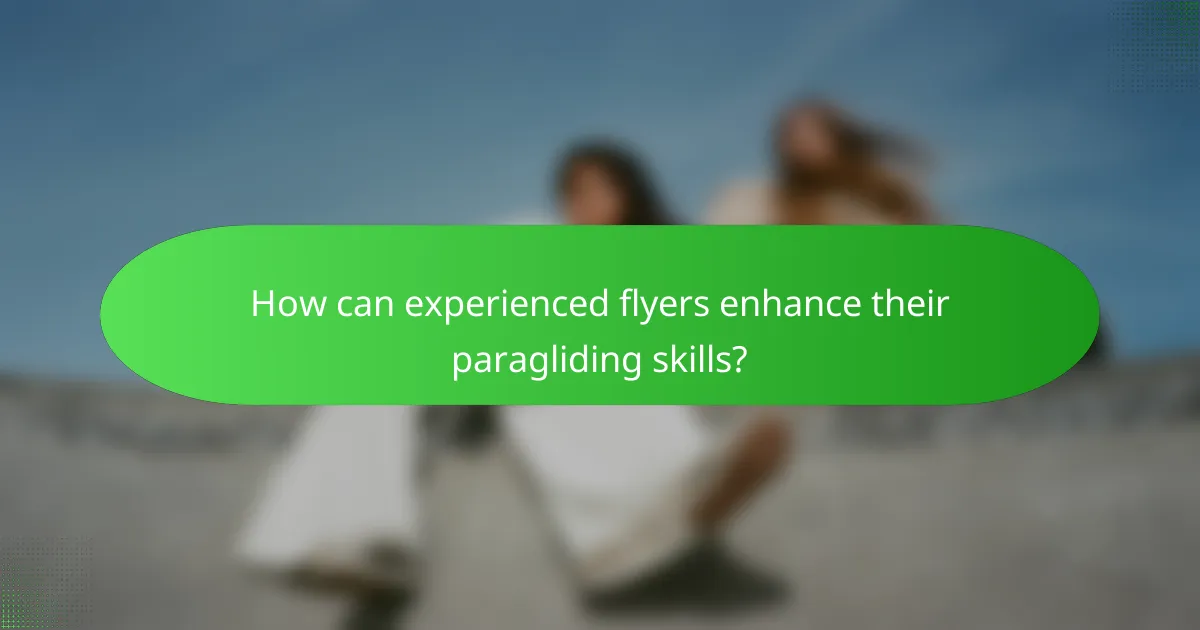 How can experienced flyers enhance their paragliding skills?
