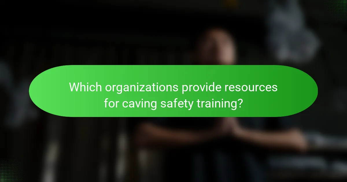 Which organizations provide resources for caving safety training?
